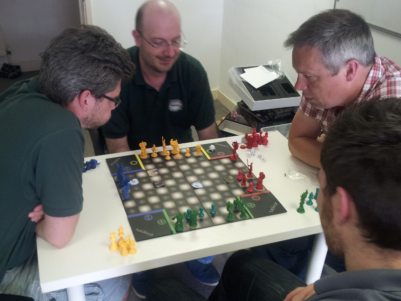 Either Ronnie's focusing on learning the rules, or he's trying to blow Alessio's King over. Hard to say.